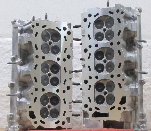 [5WRL018WC] 2010 Reconditioned Aluminum Cylinder Heads ( PAIR ) For Nissan Frontier 4.0L/3954 CID V6, 24V DOHC ( R & L ) Right Cast# R-EA2, 2349R, Left Cast# L-EA2, 2349L Compatible with : NV1500, NV2500, NV3500, Pathfinder, Xterra, Eng Code VQ40DE ( No Core Charge ) this is a Used casting so there are visible chips and scratches but they will not affect the performance of the cylinder head. Please ask for shipping information.